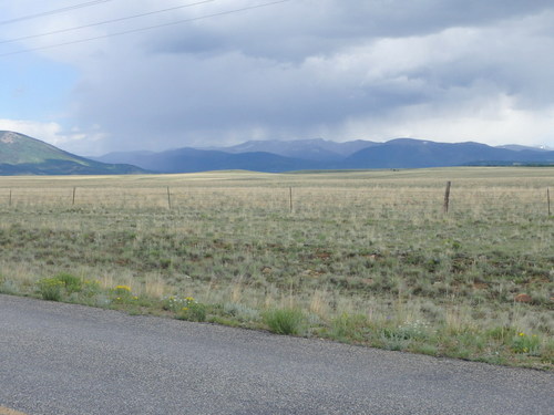 GDMBR: Looking to the SW, the afternoon clouds are starting convection and precipitation.